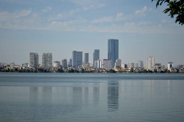 City skyline across the water in Hanoi